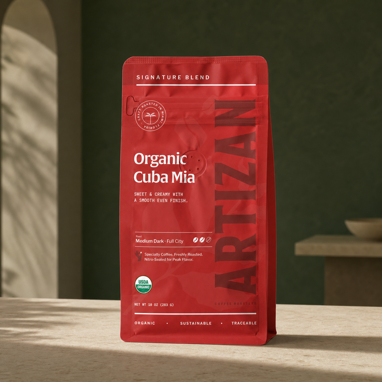 Artizan Organic Cuba Mia coffee bag on limestone counter