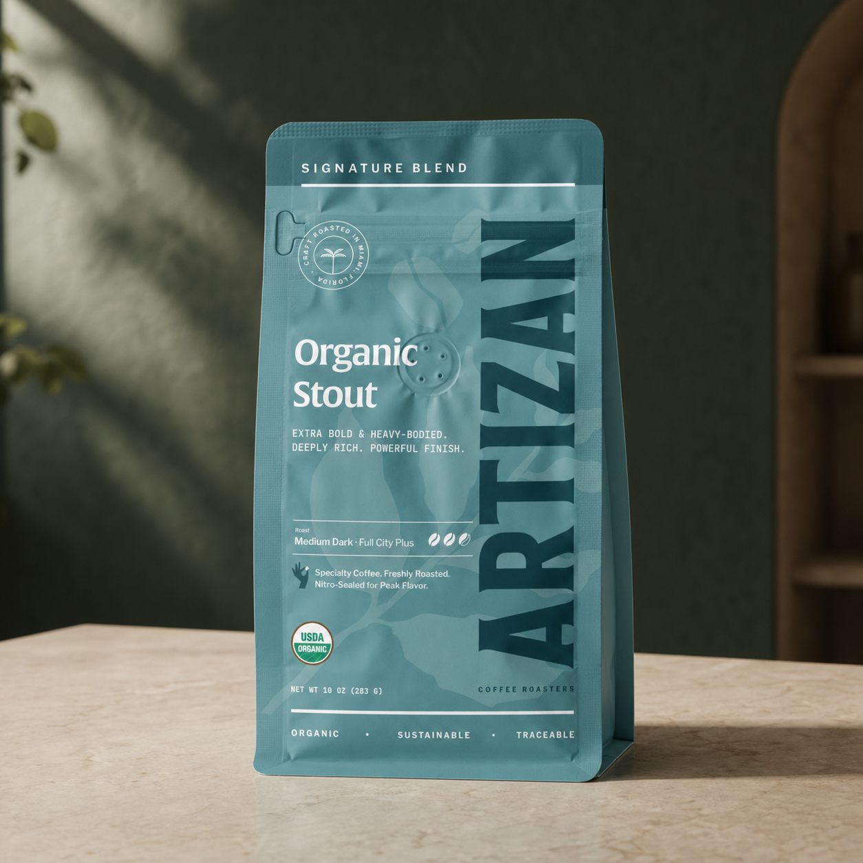 Artizan Organic Stout coffee bag on limestone counter